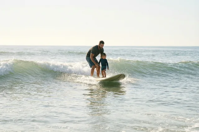 Met papa op de golven