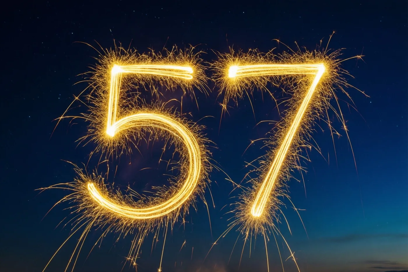 Gouden lichtsporen van sterretjes vormen 57 tegen een donkere nachtlucht met zwakke sterren.